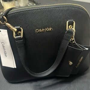 CALVIN KLEIN ROUND SATCHEL CK LOGO HANDBAG
Original price: $ 158.00